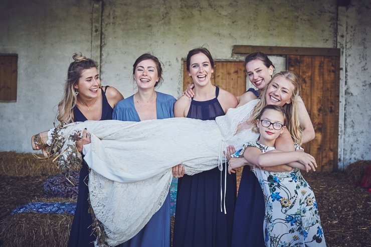 natural wedding photo of happy guest at eco wedding at East Soar Farm in Devon