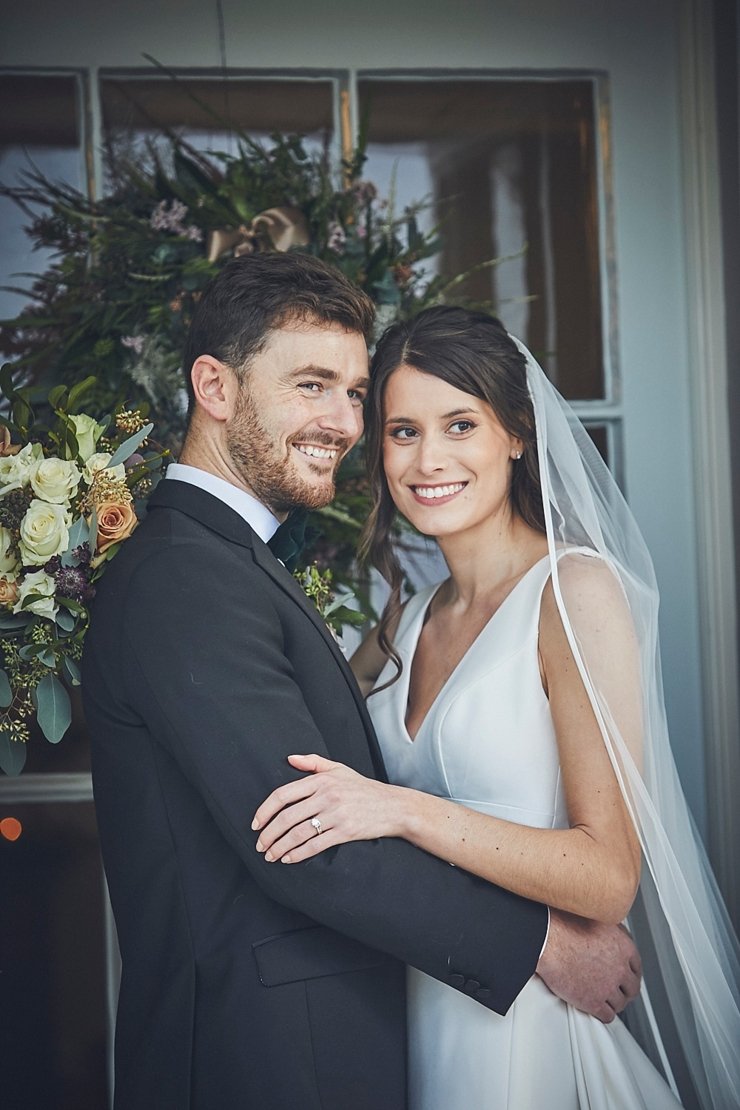 relaxed wedding photography of bride and groom at mini black tie wedding in Devon