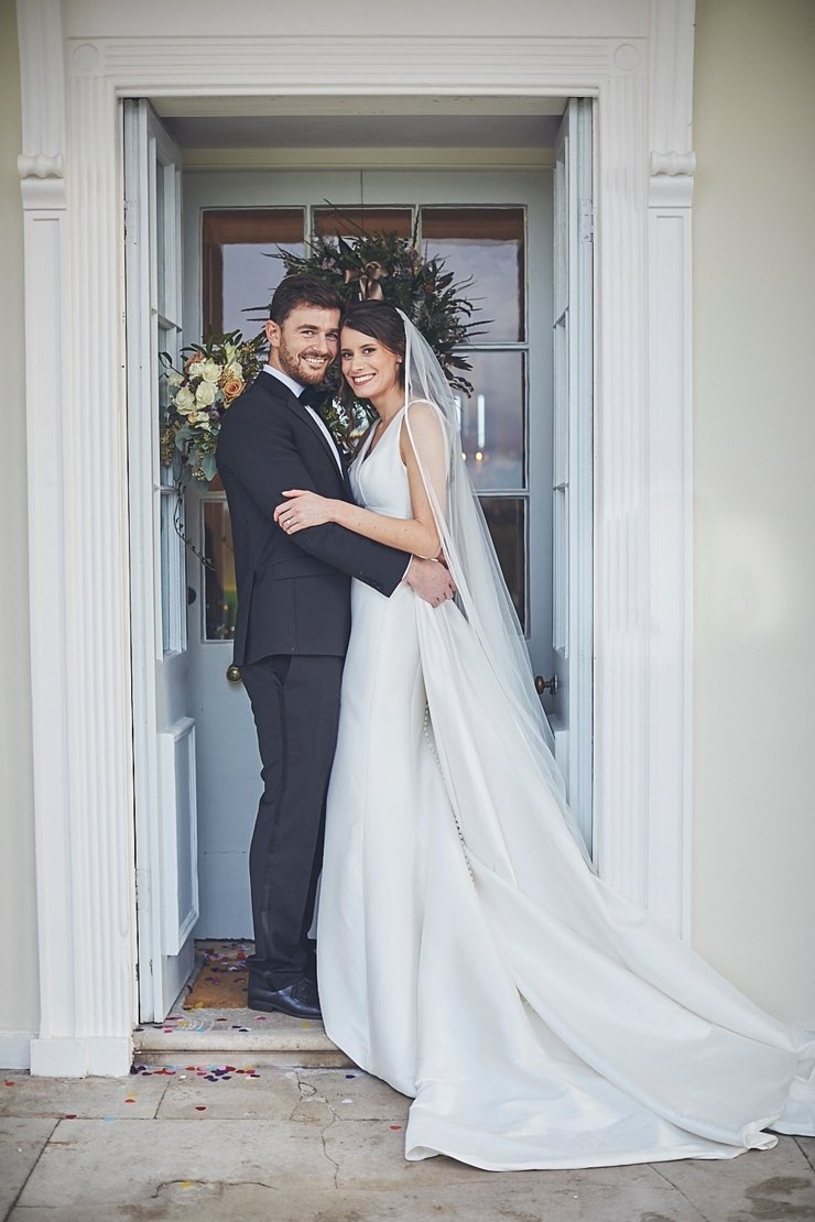 relaxed wedding photography of bride and groom at mini black tie wedding in Devon