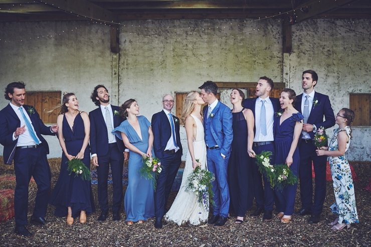 natural wedding photo of happy guest at eco wedding at East Soar Farm in Devon
