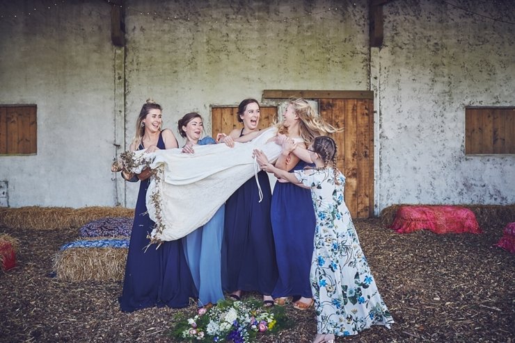 natural wedding photo of happy guest at eco wedding at East Soar Farm in Devon