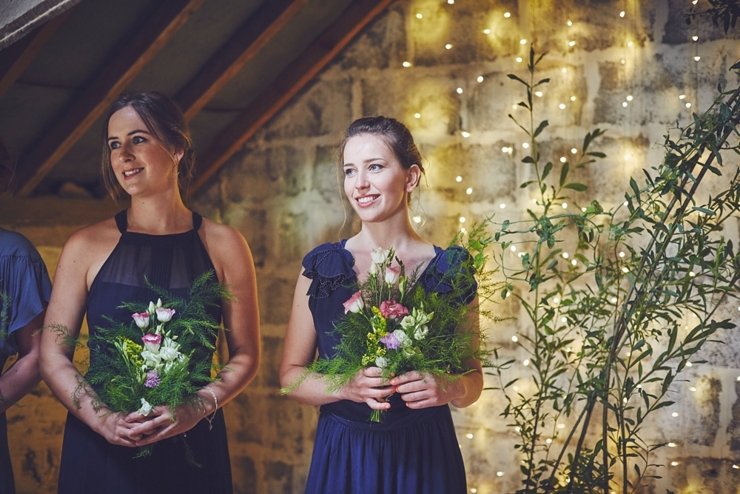 bride and groom walk aisle together at wedding blessing at East Soar in Devon